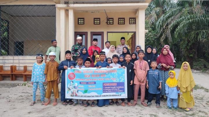 Bhabinkamtibmas dan Babinsa Desa Buluh Apo Serahkan Meja Belajar untuk Rumah Tahfiz