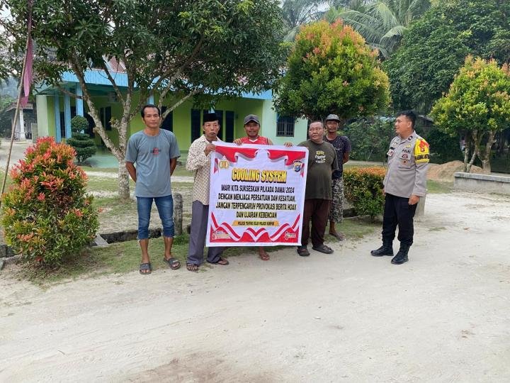 Cooling System di Desa Kota Baru, Polsek Tapung Hilir Ajak Warga untuk Bijak Bermedia Sosial