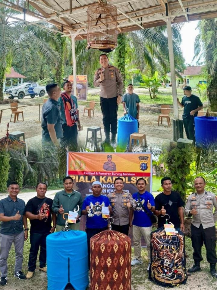 Kapolsek Langgam Kampanyekan Green Policing Melalui Lomba Burung Berkicau