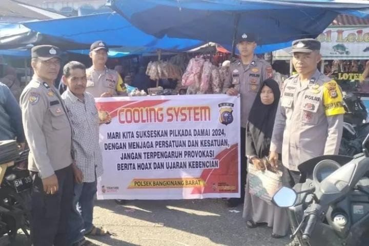 Polsek Bangkinang Barat Imbau Jaga Kamtibmas dan Sukseskan Pilkada di Pasar Kuok