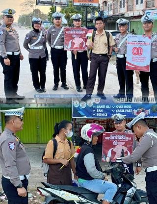 Tingkatkan Jiwa Nasionalisme, Polres Pelalawan Bagikan Ratusan Bendera Merah Putih ke Masyarakat