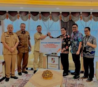 BNI Berbagi Salurkan Bantuan Tanggap Darurat Korban Banjir di Pekanbaru 