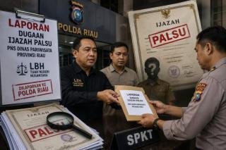 Dugaan Ijazah Palsu, Oknum ASN Pemprov Riau Dilaporkan ke Polda
