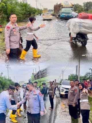 Kapolres Pelalawan Tempatkan Personel Atasi Kemacetan di Jalintim Tergenang Banjir